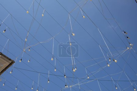 Bulbs hanging from the sky in the streets of Timisoara,Romania. High quality photo