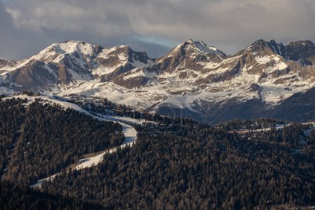 Photo for Aerial drone view of Madonna di Campiglio and ursus snowpark in Val Rendena dolomites Trentino Italy in winter - Royalty Free Image