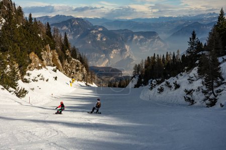 Photo for Snow covered Italian Dolomites at winter. Ski resort Paganella Andalo, Trentino-Alto Adige, Italy. Ski slopes and snow holidays in Andalo in the Italian Dolomites, ski resort in the Alps. - Royalty Free Image