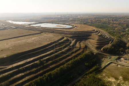 Industrial coal mine, abstract sendimentation tank of mine in Poland. Industrial lake Aerial drone photo view. Settling tanks and clarifiers are on wastewater treatment plant.