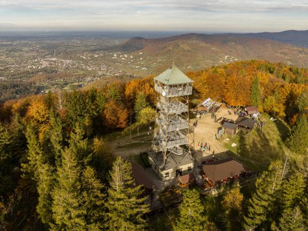 Wielka Czantoria and Mala Czantoria hill in Beskid Slaski mountains in Poland. Observation tower in the mountains during late autumn day with clear sky. Polish hill mountains beskidy. Autumn i beskid mountains. 