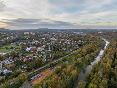 Ustron Aerial View. Scenery of the town and health resort in Ustron on the hills of the Silesian Beskids, Poland. Aerial drone view of beskid mountains in Ustron. Vistula River flows through Ustron