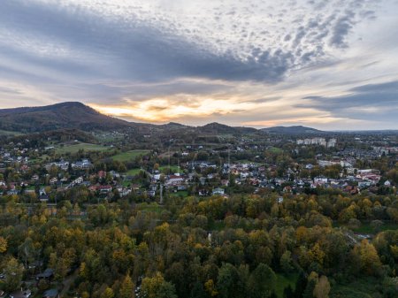 Ustron Aerial View. Scenery of the town and health resort in Ustron on the hills of the Silesian Beskids, Poland. Aerial drone view of beskid mountains in Ustron.