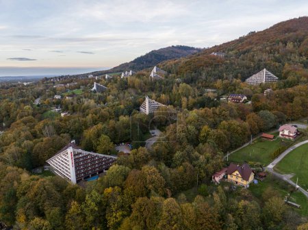 Ustron Aerial View. Scenery of the town and health resort in Ustron on the hills of the Silesian Beskids, Poland. Aerial drone view of beskid mountains in Ustron.