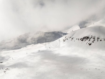 Photo for Aerial drone view of Gudauri ski resort in winter. Caucasus mountains in Georgia. Kudebi, Bidara, Sadzele, Kobi aerial panorama in caucasus winter mountains. - Royalty Free Image