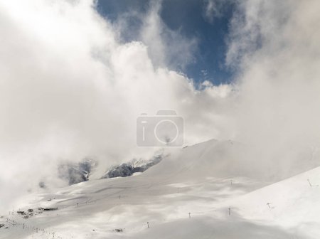 Aerial drone view of Gudauri ski resort in winter. Caucasus mountains in Georgia. Kudebi, Bidara, Sadzele, Kobi aerial panorama in caucasus winter mountains.