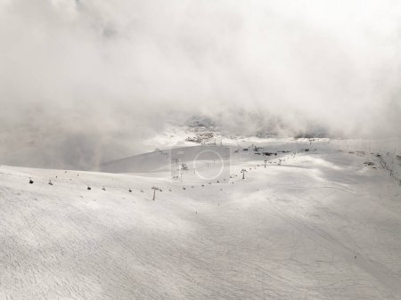 Photo for Aerial drone view of Gudauri ski resort in winter. Caucasus mountains in Georgia. Kudebi, Bidara, Sadzele, Kobi aerial panorama in caucasus winter mountains. - Royalty Free Image