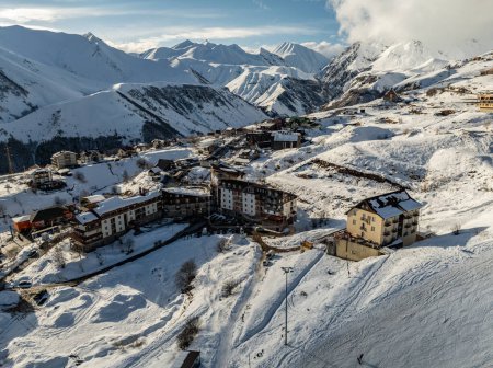 Photo for Aerial drone view of Gudauri ski resort in winter. Caucasus mountains in Georgia. Gudauri Village Panorama With Ski Resort Background From Aerial Perspective - Royalty Free Image