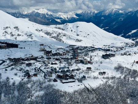 Aerial drone view of Gudauri ski resort in winter. Caucasus mountains in Georgia. Gudauri Village Panorama With Ski Resort Background From Aerial Perspective