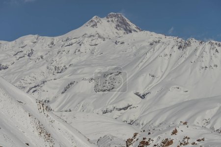 Kudebi, Bidara, Sadzele, Kobi aerial panorama in caucasus winter mountains. Aerial drone view of Gudauri ski resort in winter. Caucasus mountains in Georgia