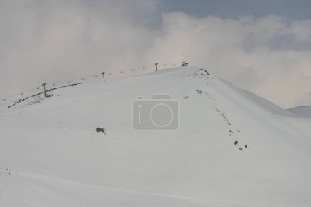 Photo for Kudebi, Bidara, Sadzele, Kobi aerial panorama in caucasus winter mountains. Aerial drone view of Gudauri ski resort in winter. Caucasus mountains in Georgia - Royalty Free Image