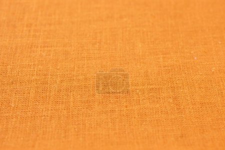 Orange Hanf Viskose natürlicher Stoff Tuchfarbe, Sacktuch raue Textur der Textilmode abstrakten Hintergrund