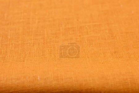 Orange Hanf Viskose natürlicher Stoff Tuchfarbe, Sacktuch raue Textur der Textilmode abstrakten Hintergrund