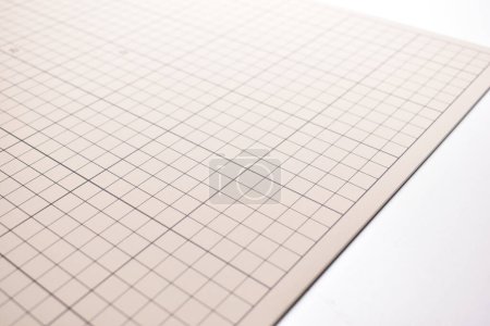 gray cutting mat board on white background with line and scale measure guide pattern for object art design, tool equipment of diy craft work