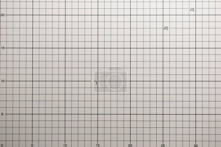 gray cutting mat board background with line and scale measure guide pattern for object art design, tool equipment of diy craft work