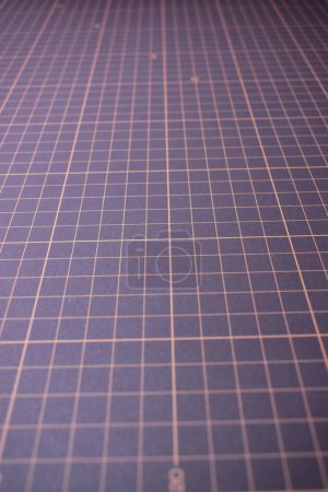 Photo for Black cutting mat board background with line and scale measure guide pattern for object art design, tool equipment of diy craft work - Royalty Free Image