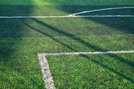 Photo for Artificial green grass soccer field with white line - Royalty Free Image