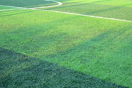 Photo for Artificial green grass soccer field with sunlight, training football yard - Royalty Free Image