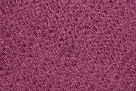 Foto de Cáñamo rojo viscosa tela natural tela color, saco textura áspera del fondo abstracto de la moda textil - Imagen libre de derechos