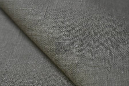 Foto de Gris cáñamo viscosa tela natural tela color; saco textura áspera de fondo abstracto moda textil - Imagen libre de derechos