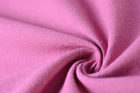 Foto de Textura de algodón rosa color de la industria textil de la tela, imagen abstracta para el fondo de diseño de tela de moda - Imagen libre de derechos