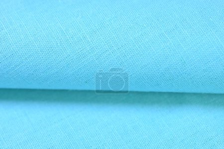 Foto de Luz azul cáñamo viscosa tela natural tela color, saco textura áspera del fondo abstracto de la moda textil - Imagen libre de derechos