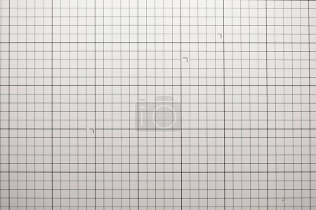 gray cutting mat board background with line and scale measure guide pattern for object art design, tool equipment of diy craft work