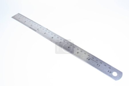metal ruler isolated on white background, object for education