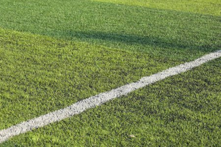 artificial green grass turf sport soccer field with black rubber granules infill