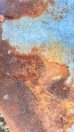 Foto de Vista de cerca del fondo de textura metálica oxidada el metal se deja bajo el sol y la lluvia en un área abierta - Imagen libre de derechos