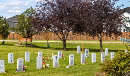 Photo for Cenotpah and Military section of the cemetery in the Town of Strathmore in Wheatland County Alberta Canada - Royalty Free Image