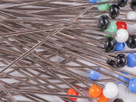 Photo for Background from sewing pins with multi-colored round heads - Royalty Free Image