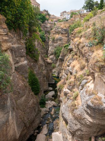 Photo for El Tajo Gorge with white houses atop in Ronda, Spain - Royalty Free Image