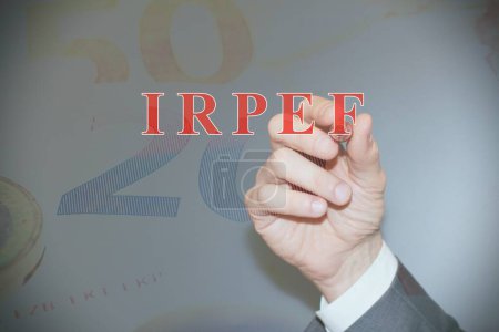 Téléchargez les photos : Homme d'affaires écriture à la main le mot IRPEF Impôt italien - en image libre de droit