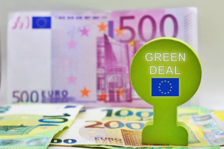 Banknotes with the sign "Green Deal" The european green deal will be the socioeconomic foundation for the further development of the european union in the 21st century.