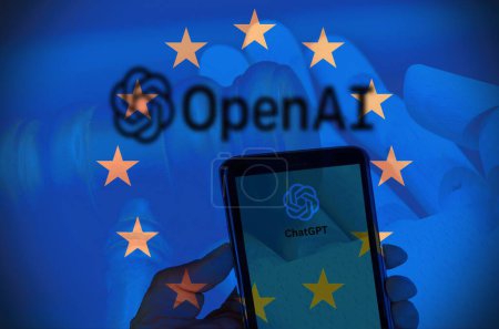 Photo for August 15th 2023, Florence, Italy,Mobile phone with website of US artificial intelligence company OpenAI LLC on screen in front of business logo with the European flag. Focus on top-left of phone display. Chat Gpt concept. - Royalty Free Image