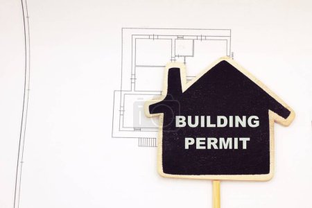 Building Permit concept with imaginary building approvation and residential home icon