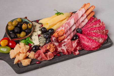 Appetizer, assortment, set, sausage, and cheese, on a wooden board, top view, no people,