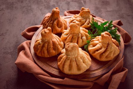 Photo for Deep-fried khinkali, khinkali with meat, traditional Georgian dish, no people, - Royalty Free Image