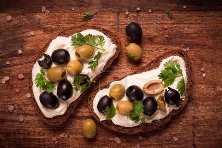 Photo for Breakfast, sandwiches, with cream cheese, olives, top view, - Royalty Free Image