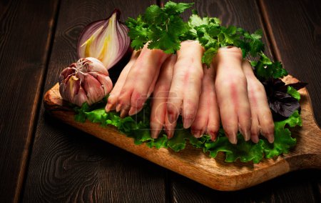 Photo for Raw, pig's feet, young piglet, piglet's hooves, - Royalty Free Image