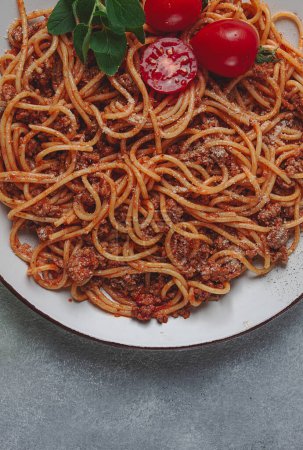 spaghetti bolognese , in a frying pan, top view, homemade, no people,