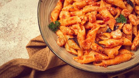 Penne pasta, with shrimp in tomato sauce, close-up, no people,