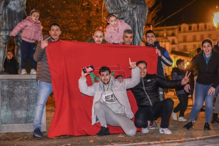 Photo for The moroccan people celebrate their victory in the world cup all over spain, in the picture a crowd of people celebrating in the main square of lugo the results of morocco - Royalty Free Image
