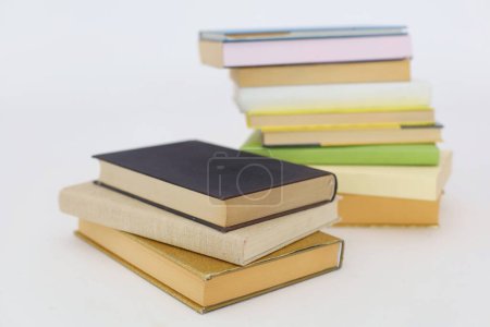 stack of books on white background