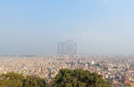Photo for View of the Kathmandu city from the top of the Syambhunath temple, showing the congested buildings with some trees. Kathmandu city - Royalty Free Image