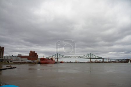 Photo for View of Jacques Cartier bridge in the city of Montreal, Quebec, Canada during an overcast day - Royalty Free Image