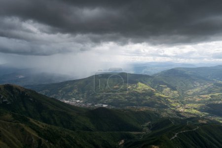 Photo for Downpour over mountains and gloomy clouds, view from Vlasic mountain - Royalty Free Image