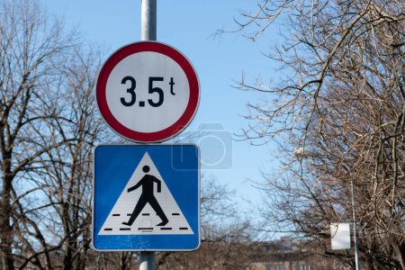 Traffic signs close up, maximum gross weight and pedestrian crossing