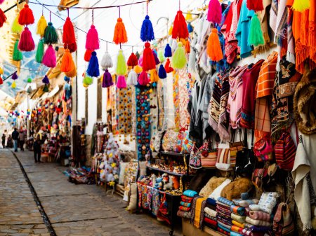 Photo for Colorful alley with handmade souvenirs in traditional Pisac market, Sacred valley of Inca, Cusco region, Peru - Royalty Free Image